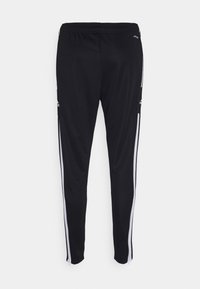 Schwarze Sporthosen mit glatter Textur, ausgestattet mit weißen Seitenstreifen, einem elastischen Bund und Reißverschlüssen an den Bündchen.