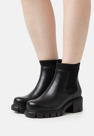 Madden Girl Platåstövletter - black