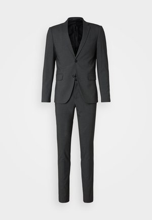 Gray suit featuring a single-breasted jacket with two buttons, notch lapels, and matching trousers. Smooth texture, tailored fit.