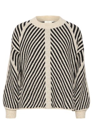 Pull en maille beige avec des rayures noires en diagonale, doté d'un col rond et de manches longues légèrement bouffantes. Tissu texturé.