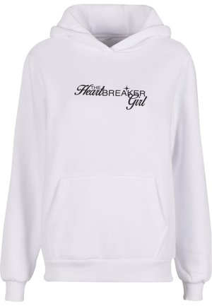 Sweatshirt à capuche blanche avec poche avant. Présente un texte noir "THE HEARTBREAKER GIRL" dans différentes styles de police. Matière en coton lisse.