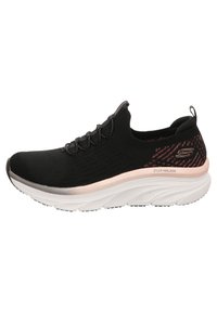 Black athletic shoe with a textured knit upper, elastic laces, and a white midsole accented with light pink details; cushioned sole.