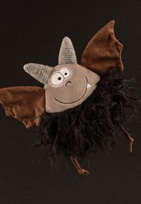 Stuffed toy bat with a beige face, gray horns, large eyes, and a black fluffy body. Features brown fabric wings and textured ear accents.