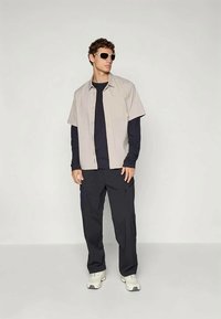 Peak Performance TRAIL  - Long sleeved top - black