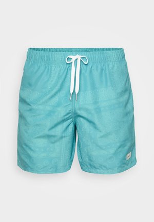 Turquoise swim shorts with elastic waistband, white drawstring, and subtle patterned accents throughout the fabric, featuring a small brand label.