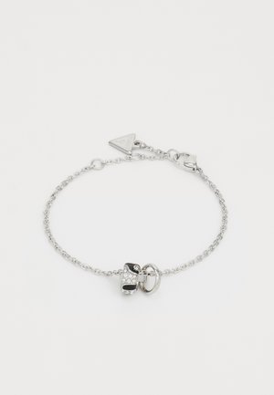 Silversmyckad kedjearmband med en svart och silver charm prydd med klara rhinestones, accentuerad av en rund ring och ett triangulärt taglås.