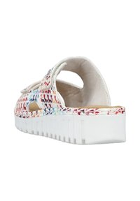 Closed-back sandal featuring a multi-colored woven upper, white rubber sole, and a padded insole for comfort. Adjustable strap included.