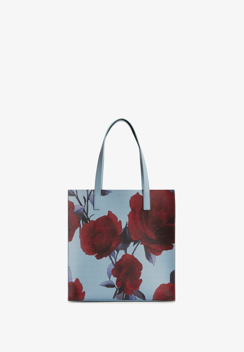 Sac fourre-tout bleu clair avec deux poignées, ornée de grands motifs de roses rouges foncées et de feuilles vertes.