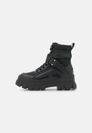 Enkellaarsjes met plateauzool - black