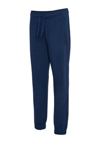Jogging en bleu marine en tissu doux, avec une taille élastique munie d'un cordon de serrage et des poignets ajustés aux chevilles.