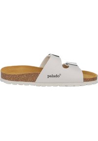 White slide sandal with two adjustable straps, cork footbed, and textured outsole. Features a logo printed on the side.