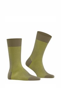 Zielono-żółte skarpetki w paski z prążkowanym mankietem, wykonane z miękkiego materiału. Posiadają wzmocniony czubek i piętę dla większej trwałości.