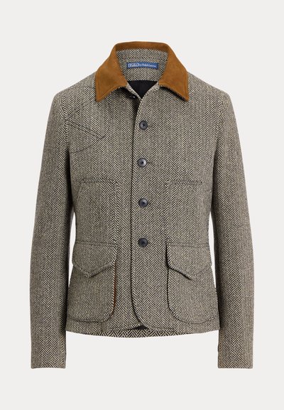 Brązowa marynarka w jodełkę z kołnierzem z aksamitu sztruksowego, zapinana na guziki, z dwoma przednimi kieszeniami i klasycznym fasonem.