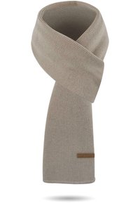 Beige gerippter Strickschal mit einer glatten Textur und einem kleinen braunen Lederetikett mit "normani" an einem Ende.