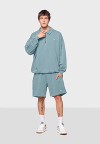 Kaotiko DAYLEN UNISEX - Sportska majica - duck blue