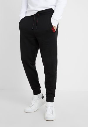DOAK - Spodnie treningowe - black