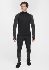 Nike Performance - Spodnie treningowe