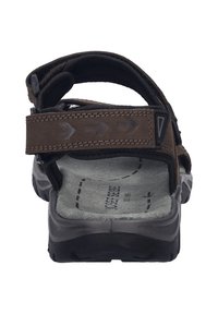 Sandalo marrone con cinturini regolabili, tomaia testurizzata, soletta grigia imbottita e suola in gomma nera con un motivo a battistrada.