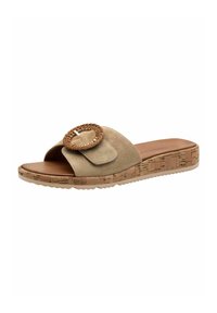 Sandale à glissière en daim beige avec un accent circulaire tressé. Présente une semelle en liège et un profil plat. Large bandeau pour un confort optimal.
