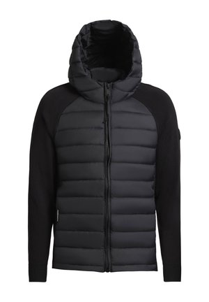 Mustan untuvapuvun, jossa on vetoketjukiinnitys ja huppu. Käsivarret ovat neulottua kangasta ja yläosa on pehmustettu. Kankaan pinta on teksturoitu, mutta vartalossa on sileä viimeistely.