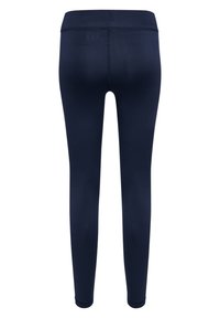 Leggings navy realizzati in un tessuto elastico. Presentano una texture liscia e una vita alta, che si restringe alla caviglia. Branding minimale visibile.