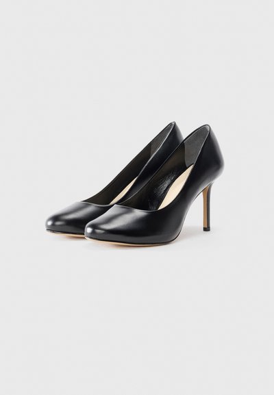 Sorte læder højhælede sko med spids tå, slank stiletto-hæl og glat finish. Har et minimalistisk design uden synlige pynt.