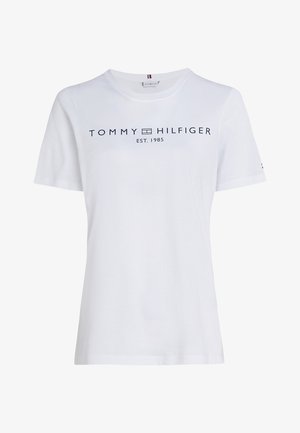 Wit katoenen T-shirt met korte mouwen, met een marineblauwe "TOMMY HILFIGER"-logo en tekst "EST. 1985" op de voorkant. Klassiek rondhalsmodel.