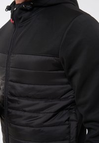 LEGEA Übergangsjacke - nero