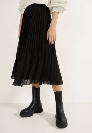 Falda acampanada - black