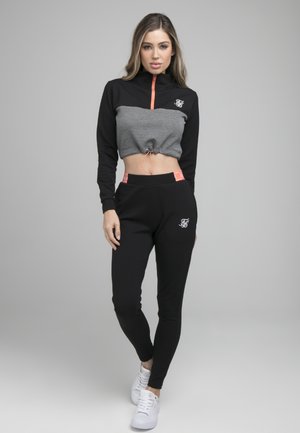 ADVANTAGE - Pantalones deportivos - black