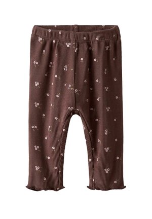 Brune ribbede leggings med et blomsterprint i pink og grøn. Har en blød tekstur og en volangkant ved anklerne. Elastisk talje.