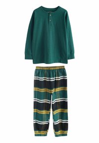 Grøn langærmet henley-top med træknapper, parret med sorte, grønne og gule ternede pyjamabukser med elastisk talje.