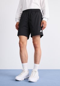 Nike Sportswear - Spodnji deli trenirk - black Miniaturna slika 1