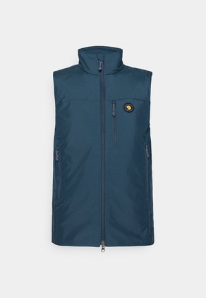 Mørkeblå ærmeløs vest lavet af let materiale med høj krave, frontlynlås og en brystlomme med et rundt logo.
