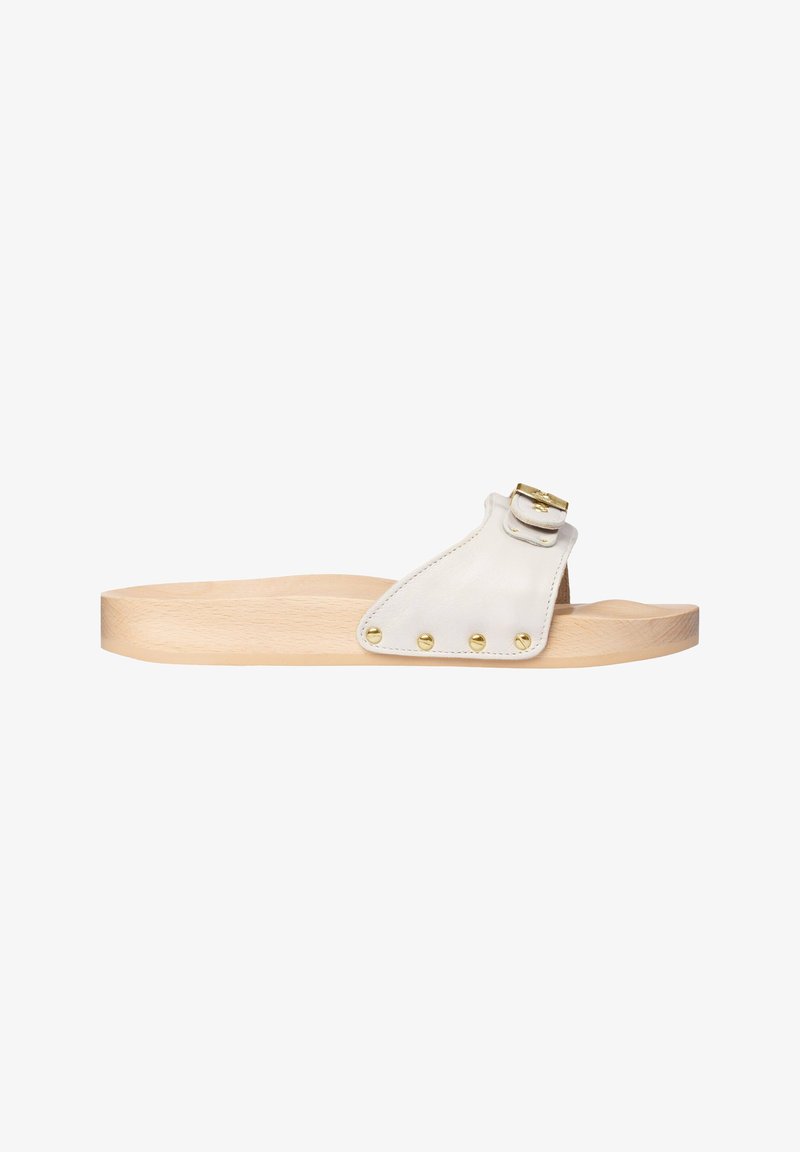 White leather sandal with a wide strap, gold buckle, and brass studs, resting on a natural wooden platform sole.