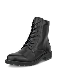 Botas de cuero negras al tobillo con un diseño de cordones, punta redondeada, parte superior texturizada y suela de goma resistente con un dibujo prominente.