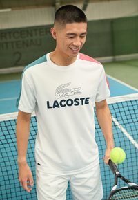 Lacoste Sport - Športne majice - white/hydro sierra red Miniaturna slika 1