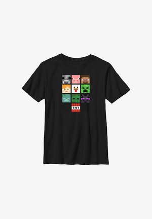 Schwarzes T-Shirt mit einem Gitterdesign aus pixelierten Charakteren und einem TNT-Logo, in mehreren Farben bedruckt und aus Baumwolle gefertigt.