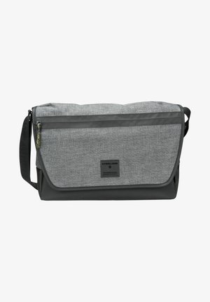 Gray and black fabric messenger bag with front zip pocket, flap closure, adjustable black shoulder strap, and small rectangular logo patch.