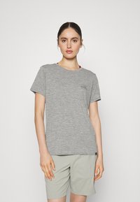 Gray short-sleeve t-shirt in a lightweight, soft fabric, featuring a crew neck and a small logo detail on the chest. Paired with light khaki shorts.