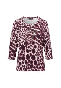 Lila und weiße Leopardenmuster-Bluse mit Dreiviertelärmeln, Rundhalsauschnitt und dekorativem, kreisförmigem Design aus Strass auf der Vorderseite.