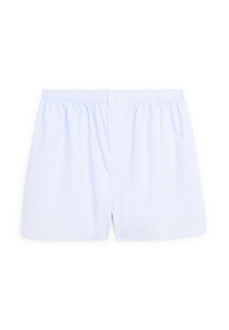 Boxer shorts in cotone azzurro chiaro con vita elastica, dotati di due bottoni frontali e un fit rilassato. Texture liscia e design semplice.