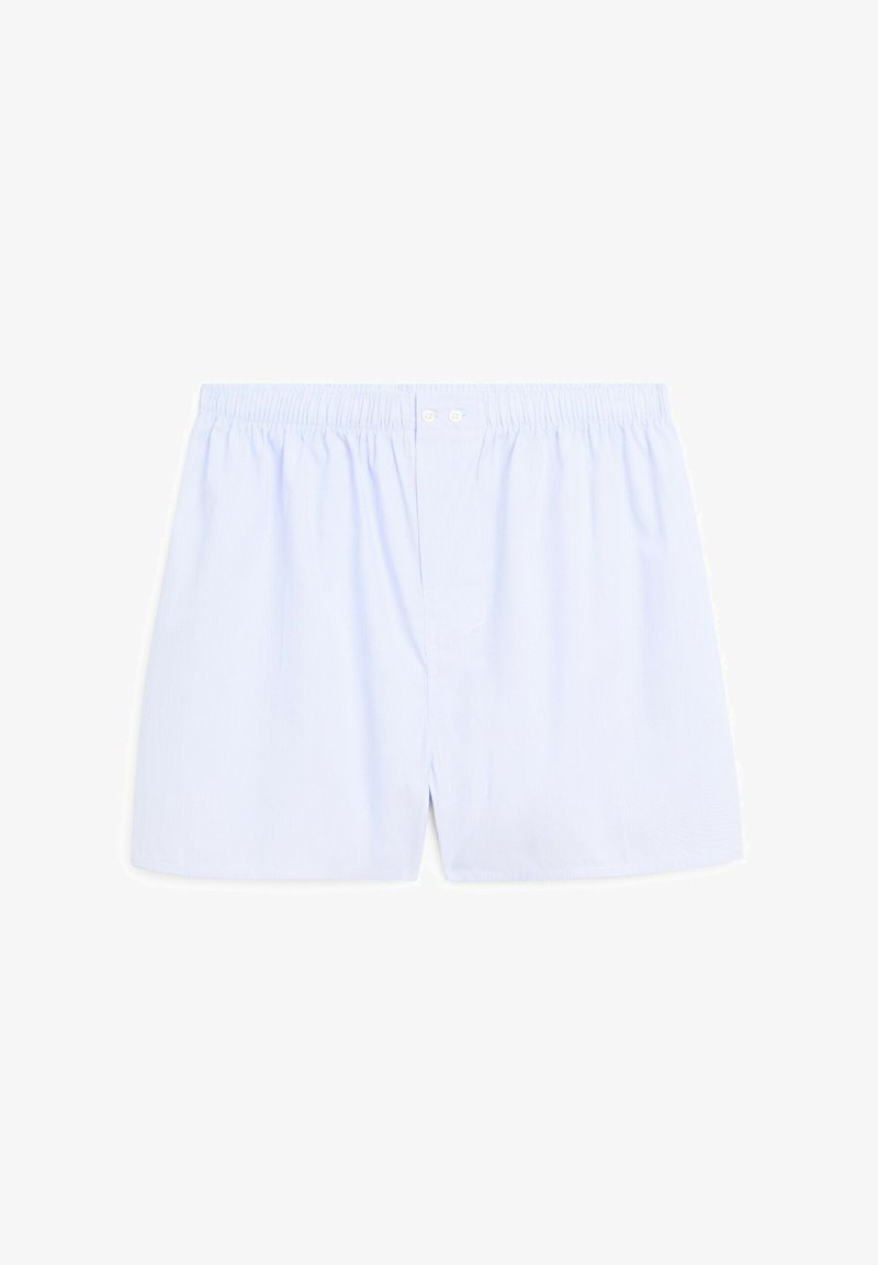 Light blue cotton boxer shorts with an elastic waistband, featuring two front buttons and a relaxed fit. Smooth texture and simple design.