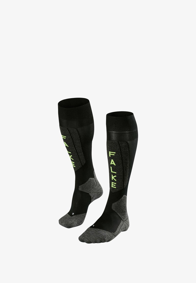 Schwarze knielange Socken mit grünem "FALKE"-Logo. Hergestellt aus einem Materialmix und mit einem strukturierten unteren Bereich für Grip und Komfort.