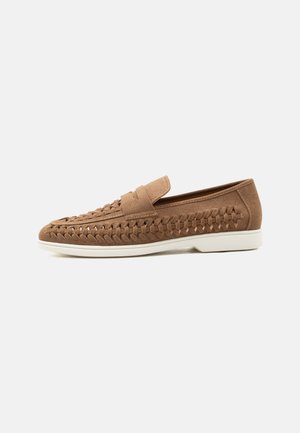 Brown suede loafer with woven side detailing and white rubber sole, shown in profile on light gray background.