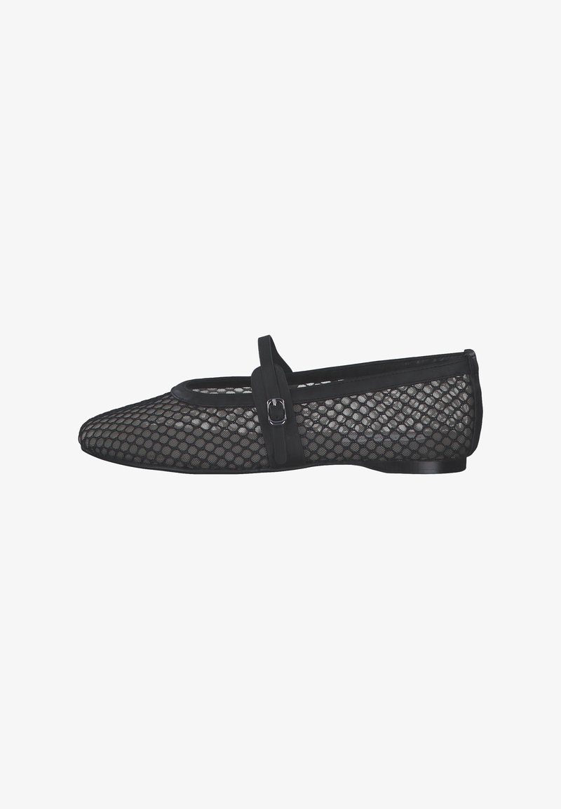 Chaussure plate noire avec un motif en nid d'abeille en maille et une fine bride avec une petite boucle argentée sur le dessus.