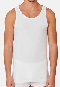 White tank top made of soft, lightweight fabric. Features a crew neckline and sleeveless design with a smooth texture.