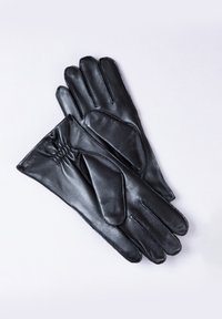 Black leather gloves featuring a smooth texture, gathered wrist design, and three distinct finger sections.