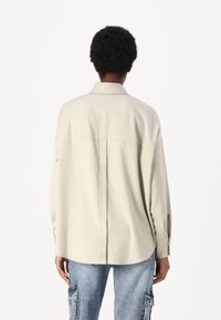 DRYKORN LYSILA - Button-down blouse - brown