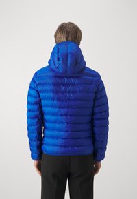 Lacoste Outdoorová bunda - bleu